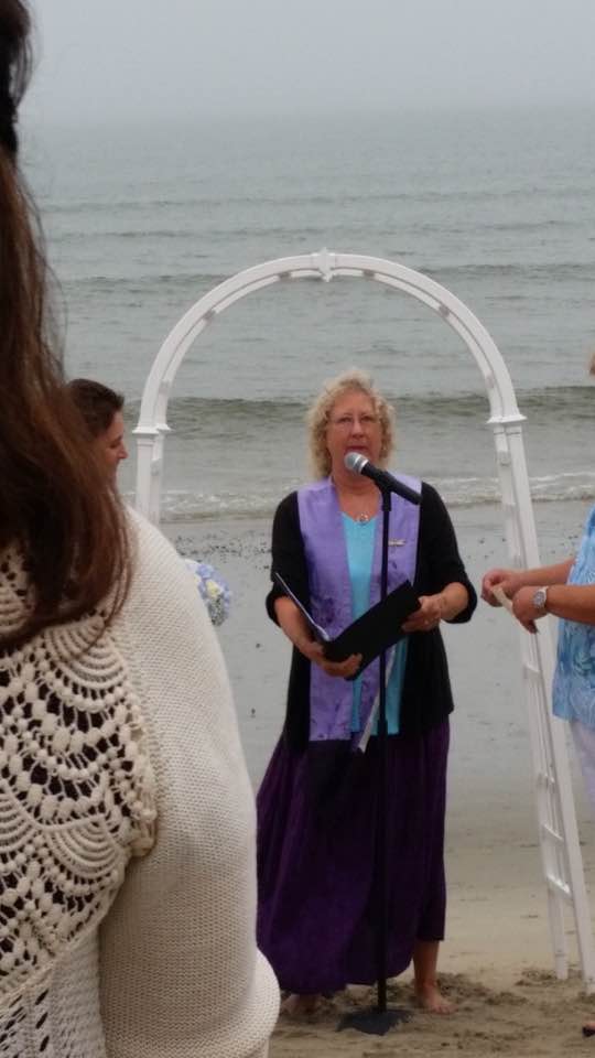 D'Vorah Kelley officiating a wedding 