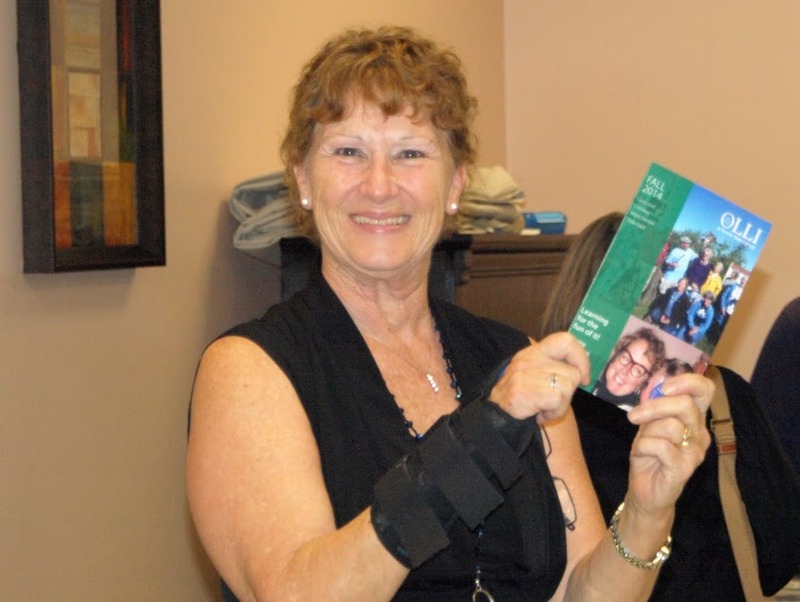 Gagne with OLLI pamphlet 