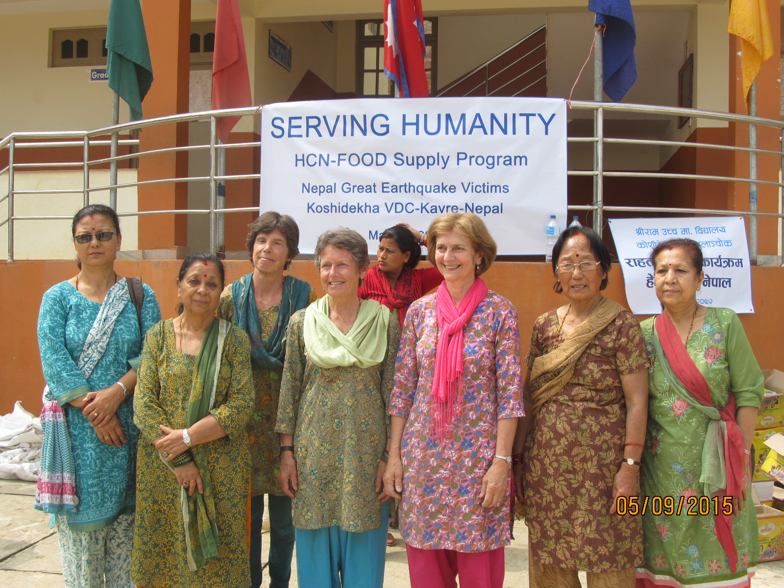 Holcombe with group of teachers