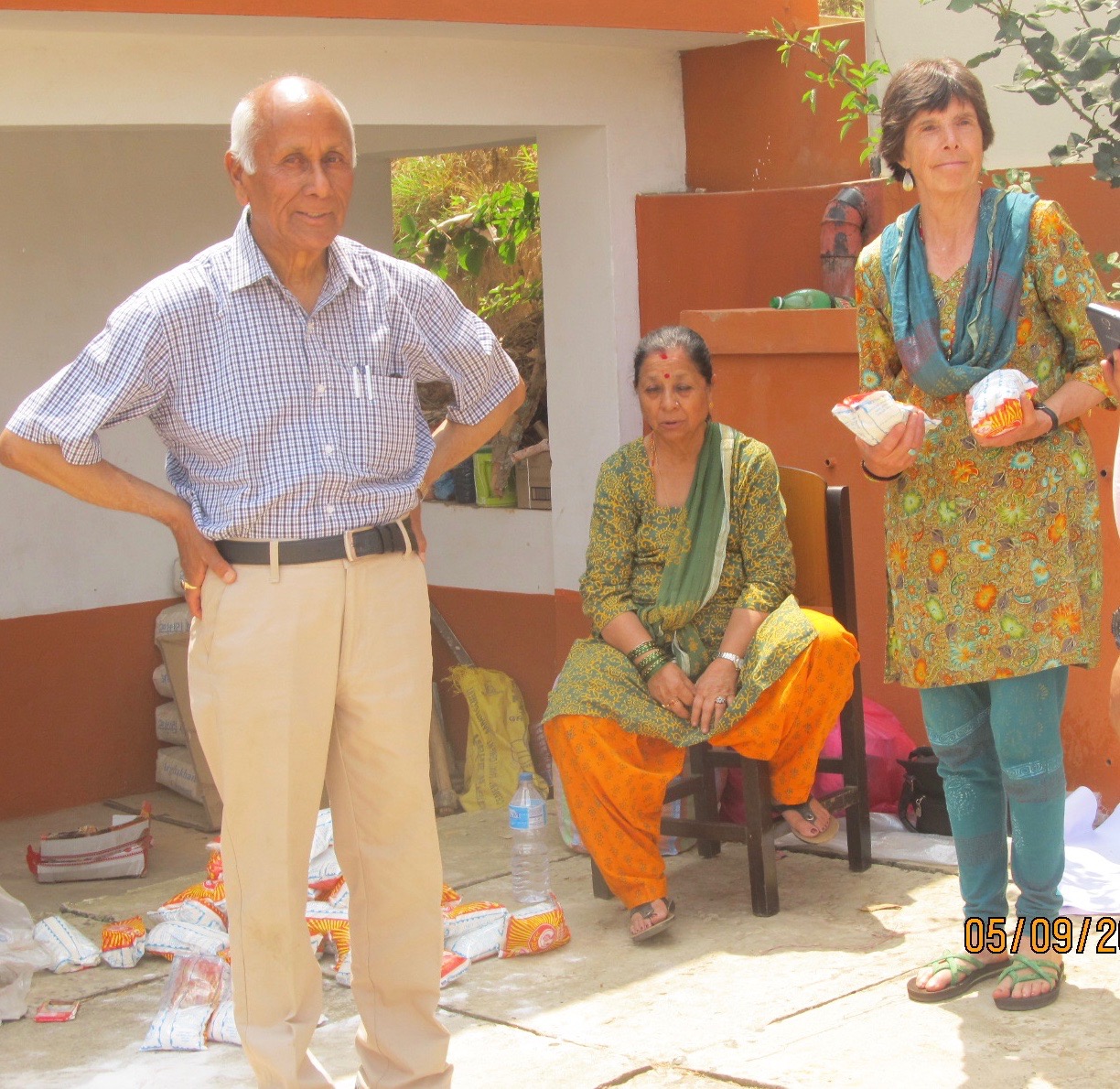 Holcombe standing outside