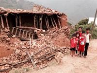 Children with earthquake rubble