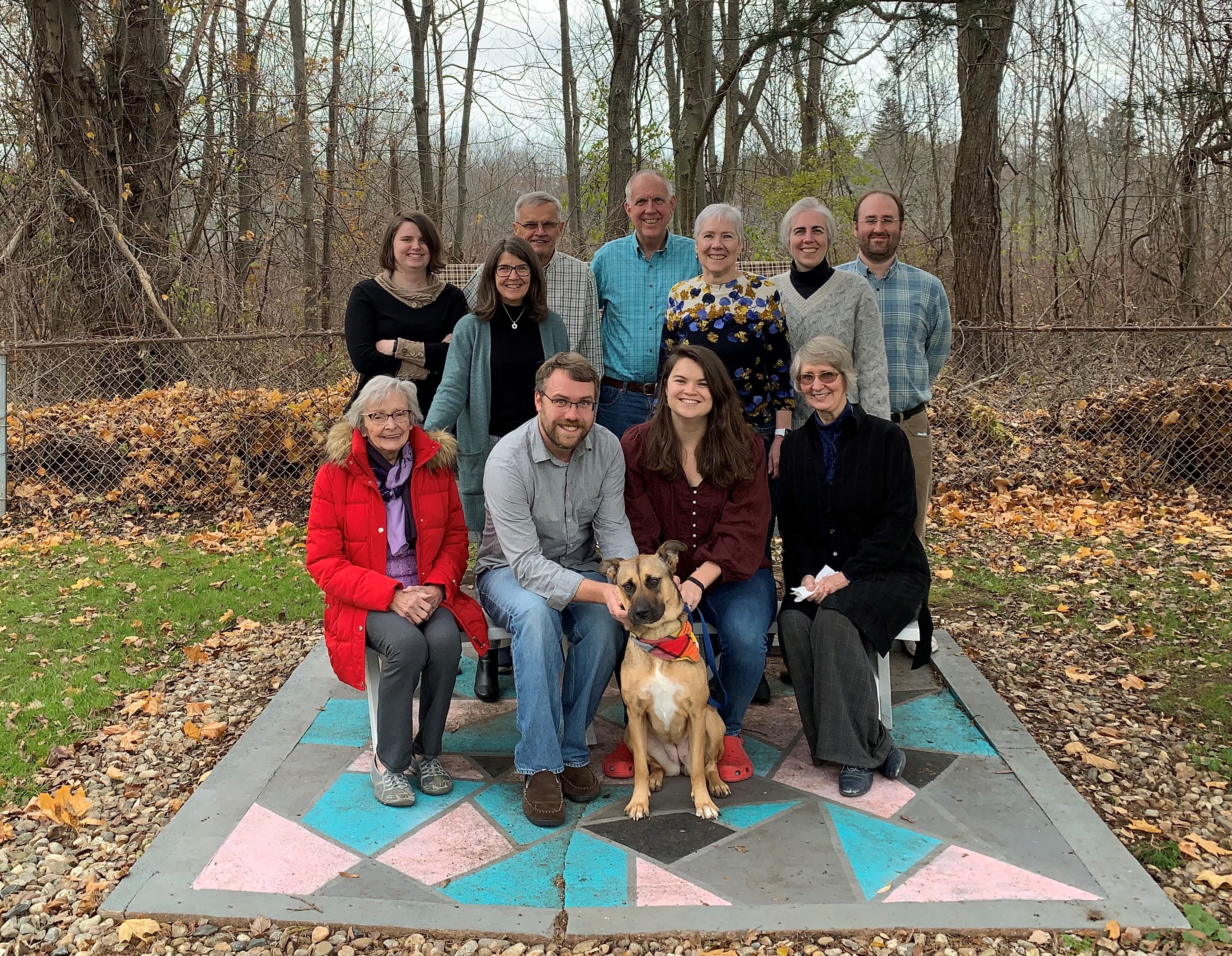 A family portrait taken outside. 