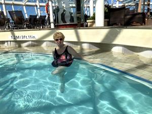 Linda swimming in a pool
