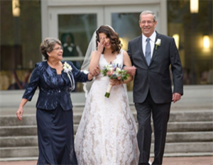 Trudel with daughter on wedding day